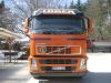 Oranger Lkw mit Fahrzeugbeschriftung von der Firmer Loder von 089 Werbung beklebt in M�nchen
